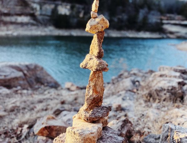 rocks stacked by a river